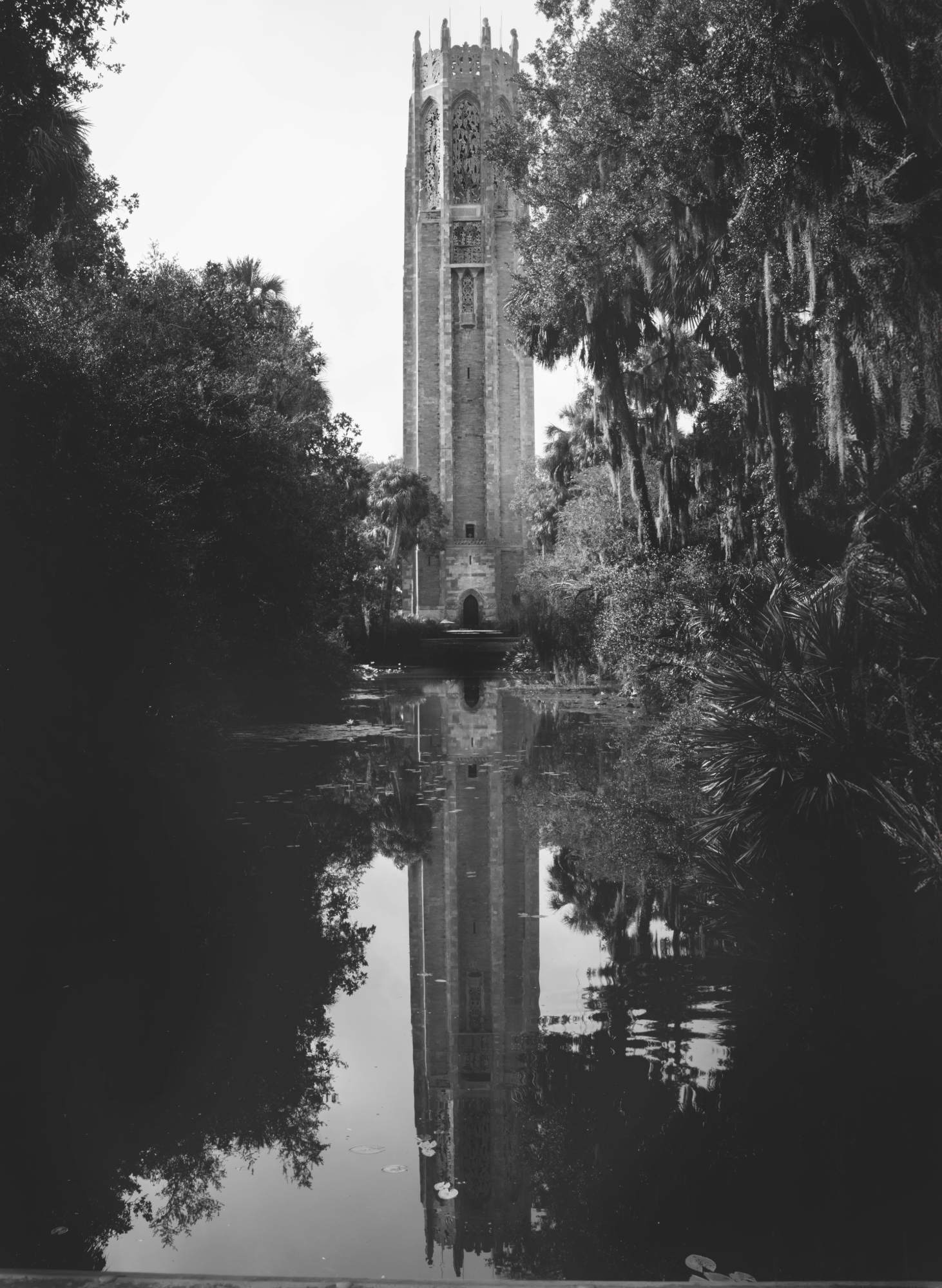 black and white tower with reflection