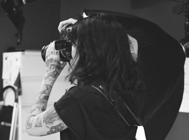 facing away taking a picture